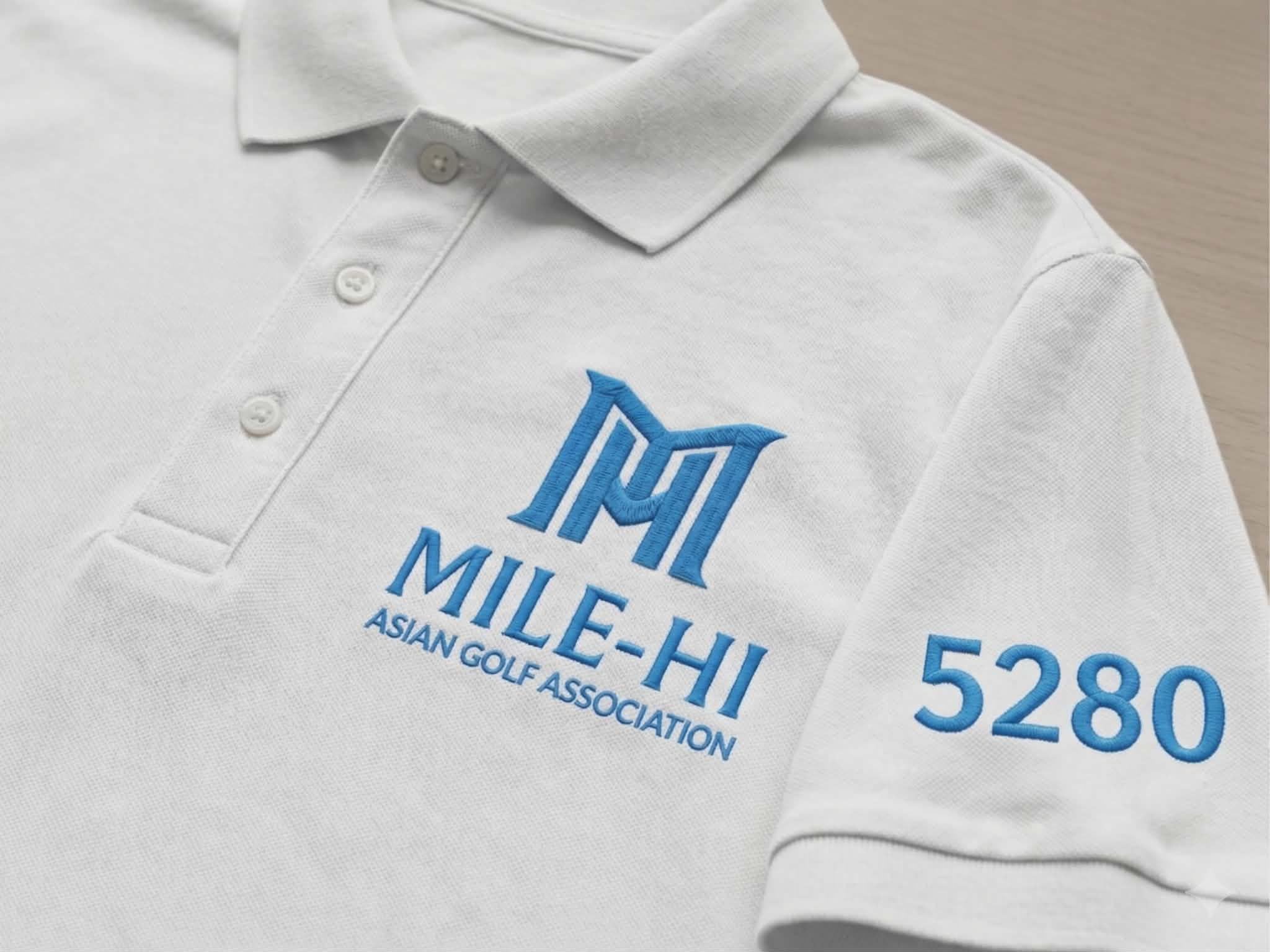 White Polo with Embroidered Logo